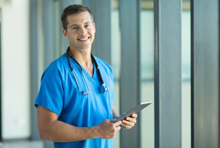 Cheerful,Young,Nurse,With,Tablet,Pc,In,Office