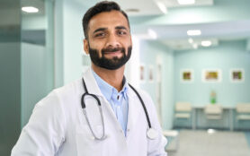 Portrait,Of,Happy,Friendly,Male,Indian,Latin,Doctor,Medical,Worker