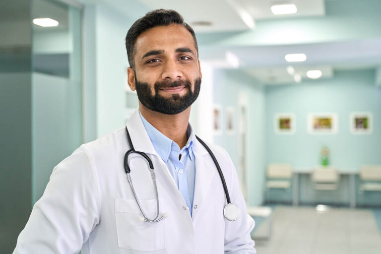 Portrait,Of,Happy,Friendly,Male,Indian,Latin,Doctor,Medical,Worker