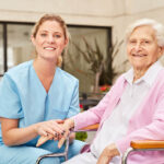 Caring,Geriatric,Nurse,And,Happy,Senior,Woman,In,Wheelchair,At