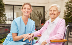 Caring,Geriatric,Nurse,And,Happy,Senior,Woman,In,Wheelchair,At