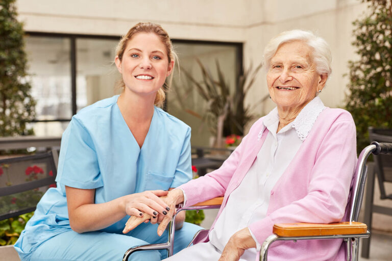 Caring,Geriatric,Nurse,And,Happy,Senior,Woman,In,Wheelchair,At