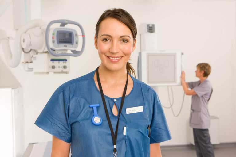 A,Medium,Shot,Of,A,Young,Adult,Radiologist,Smiling,At