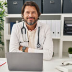 Handsome,Middle,Age,Doctor,Man,Working,At,The,Clinic,Happy