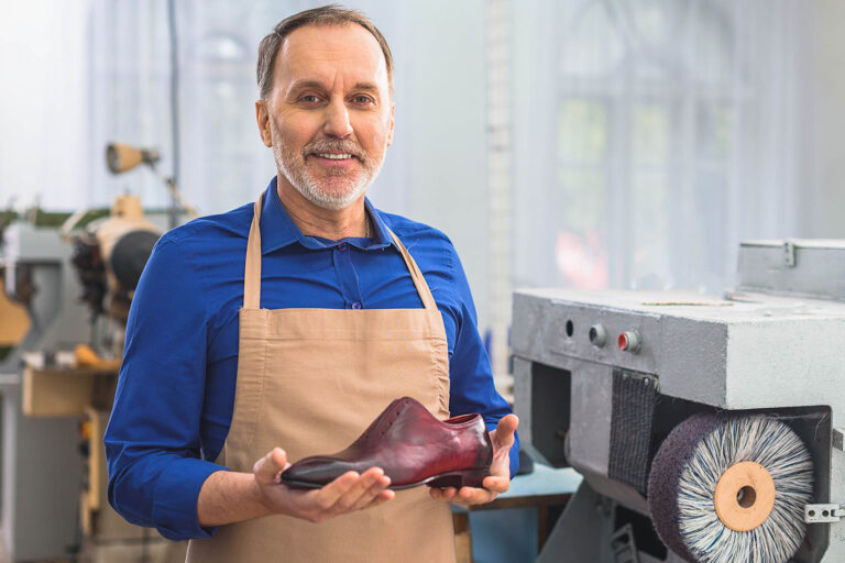 Cobbler,Holding,A,Brand,New,Footwear