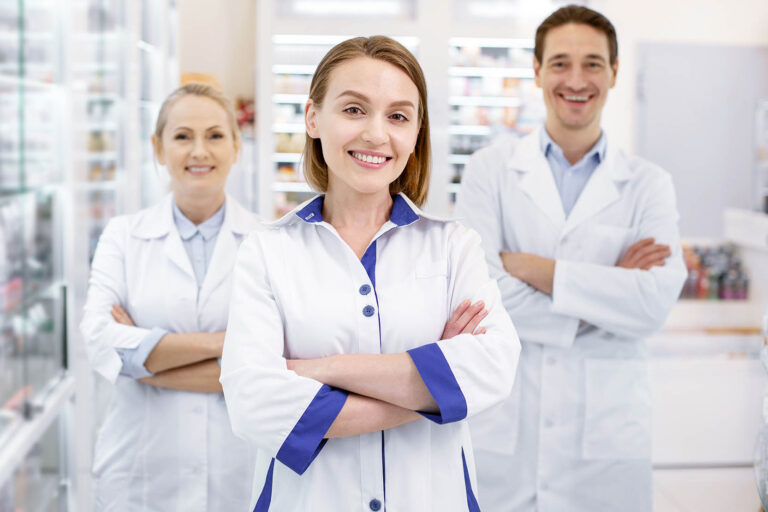 Welcome,In,Drugstore.,Jolly,Three,Pharmacists,Crossing,Arms,While,Staying