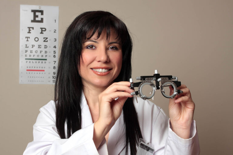 An,Eye,Doctor,Holding,A,Pair,Of,Eye,Test,Trial