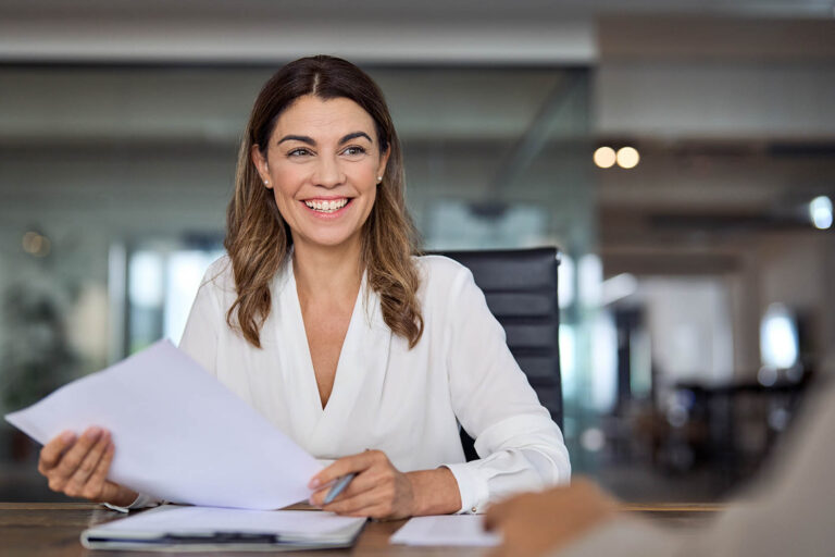 Smiling,Mature,Business,Woman,Hr,Holding,Cv,Document,At,Job