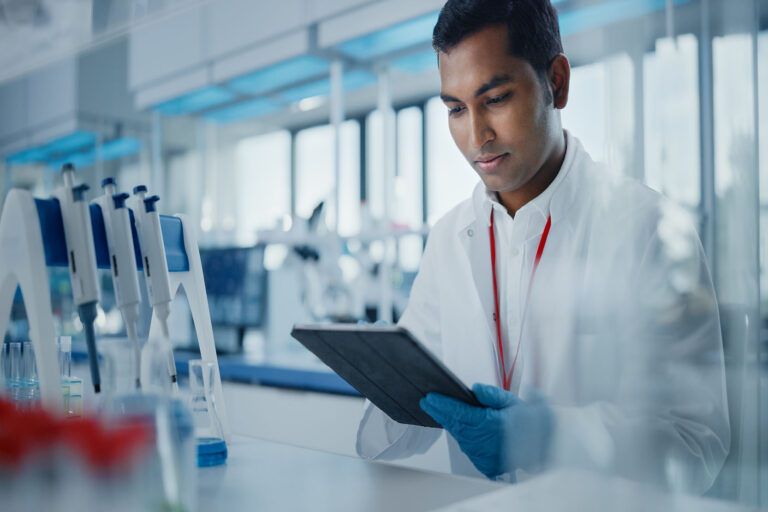 Medical,Research,Laboratory:,Portrait,Of,A,Handsome,Male,Scientist,Using